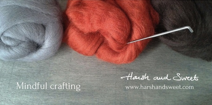 Image of felting wool and needle introducing Harsh and Sweet's blog on mindful crafting